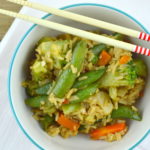 This Asian inspired vegetable rice recipe will make the entire family happy! It's full of vegetables, lots of flavors, and can be made in under 20 minutes. #simpleswaps #ad | mybigfathappylife.com