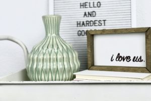 Making a DIY wood sign is easier to than you might think! Here’s a great tutorial for how you can make your own wood "i love us" sign for your home.