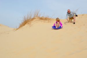 Enjoy a day with family taking in the beautiful sand dunes and sand sledding at Monahans Sandhills State Park.