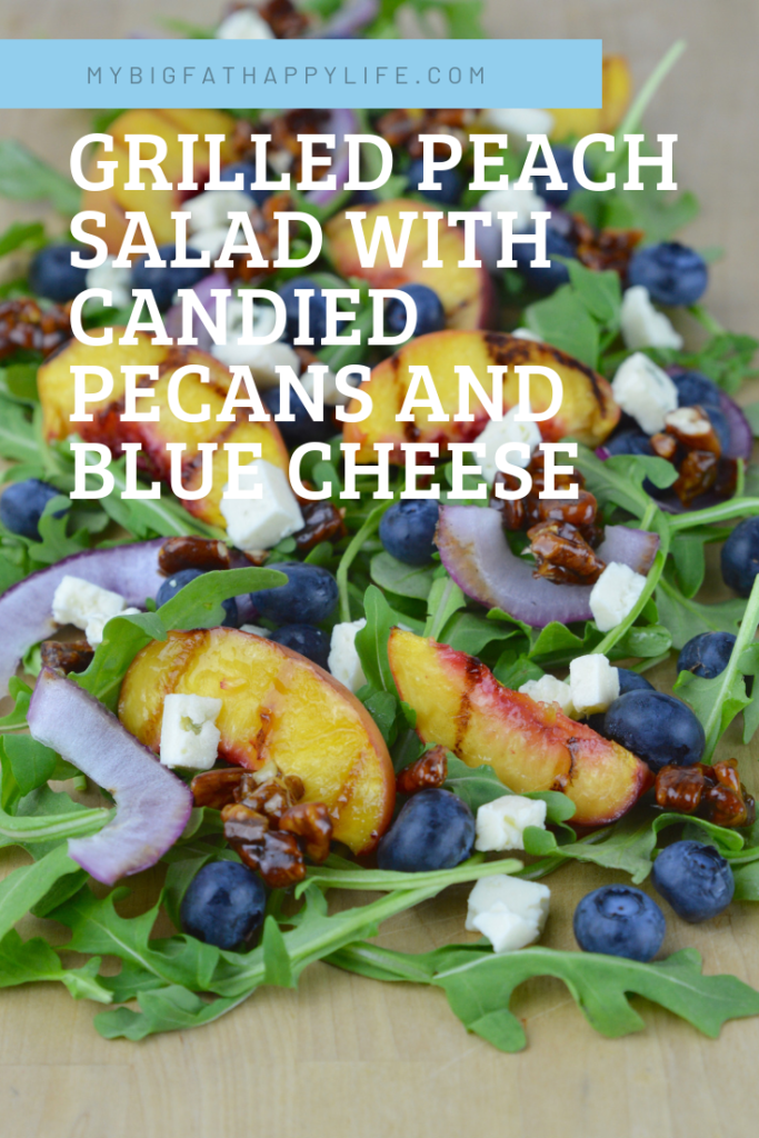 Grilled Peach Salad is the best summer side dish recipe!  The peaches and onions are grilled and served with arugula, blueberries, candied pecans, and blue cheese. 