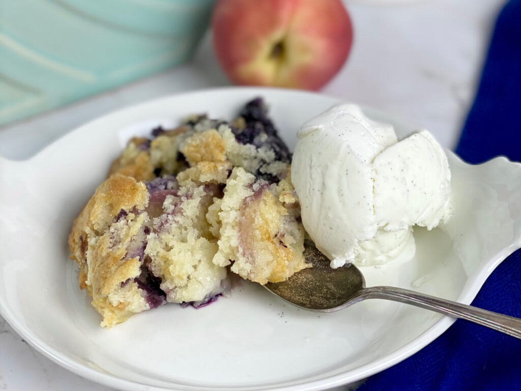 This easy, six-ingredient Peach Blueberry Cobbler recipe is bursting with flavor and comes out perfect every time!