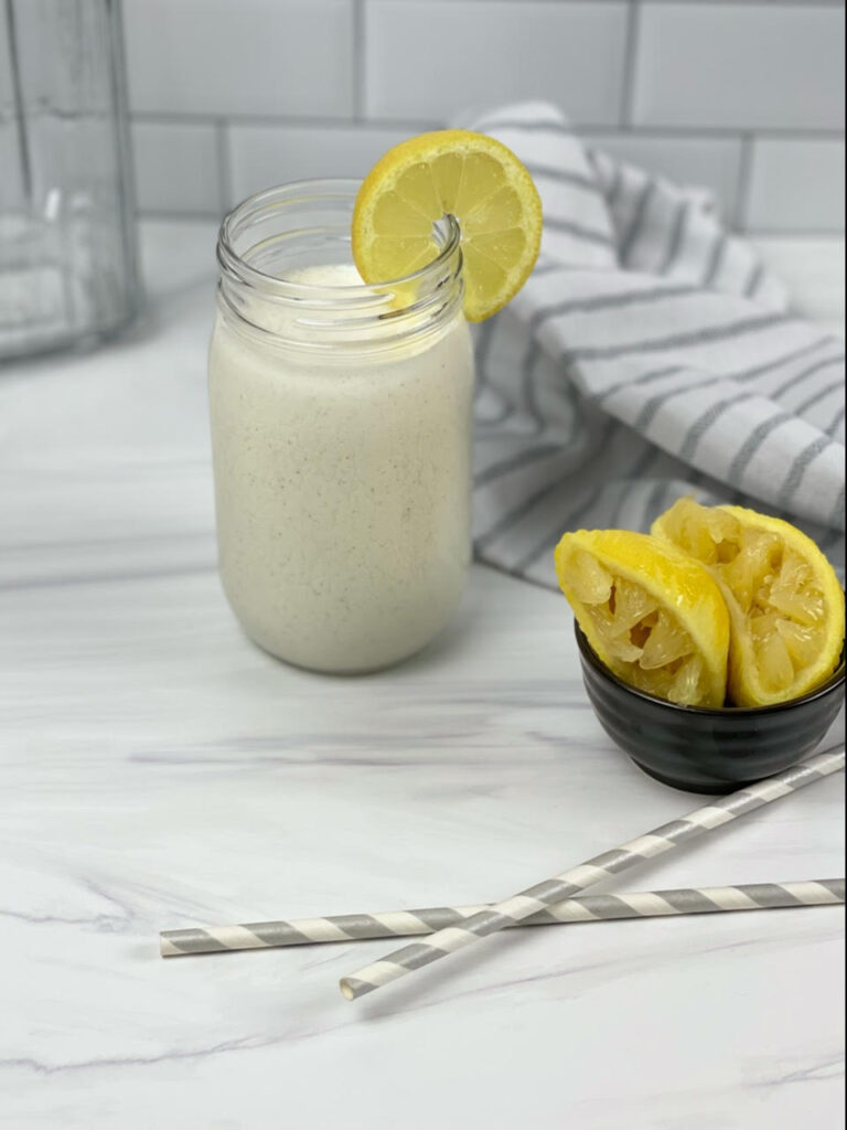 This creamy and delicious Frosted Lemonade is both tart and sweet. It is the perfect frozen treat to enjoy this summer on a warm afternoon.