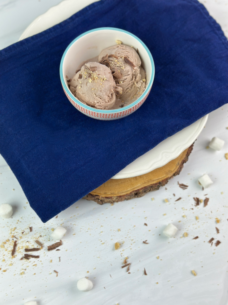 This delicious S'mores Ice Cream is easy to make and tastes just like freshly roasted over the campfire s'mores with chocolate, marshmallow, and graham cracker.