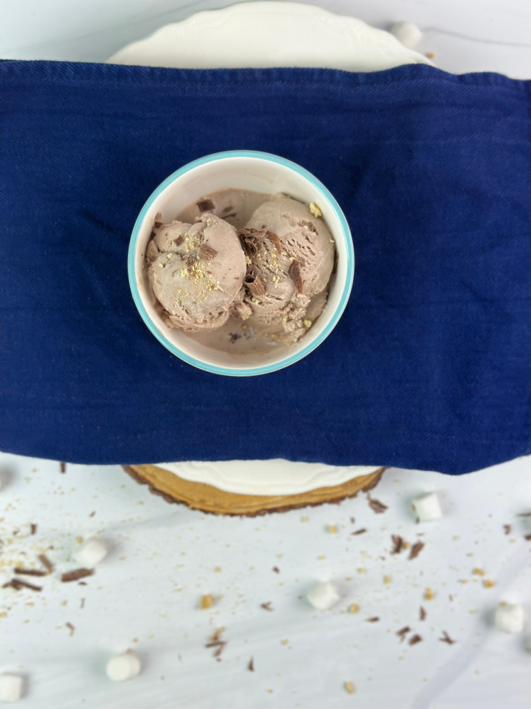 This delicious S'mores Ice Cream is easy to make and tastes just like freshly roasted over the campfire s'mores with chocolate, marshmallow, and graham cracker.